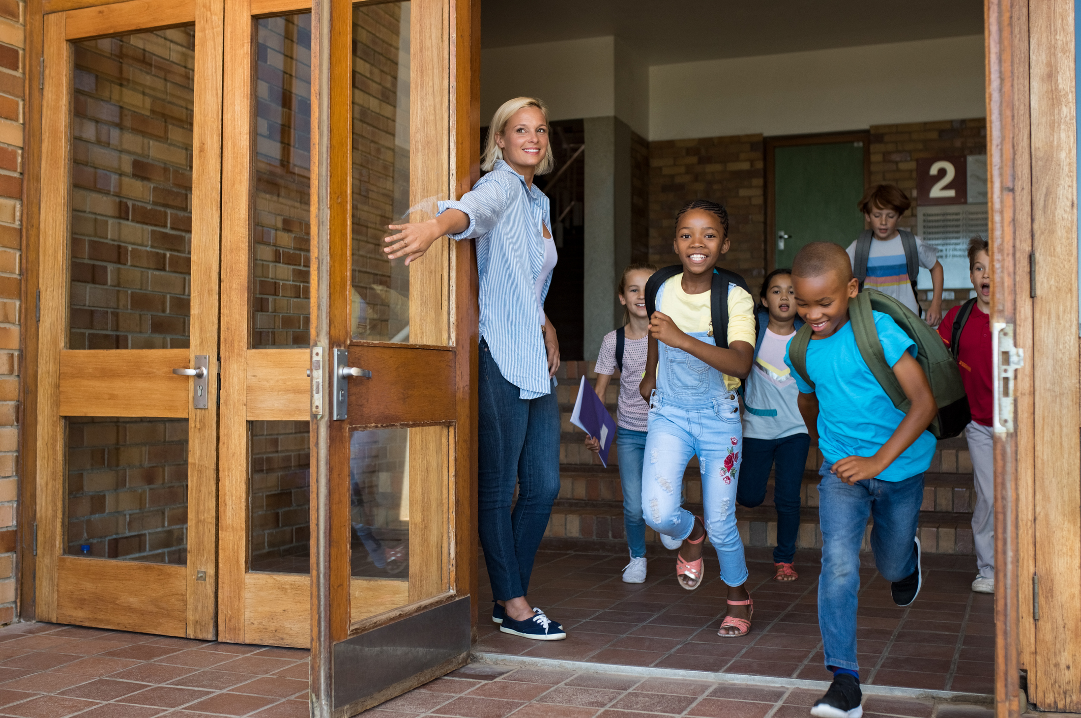 students leaving school for holiday