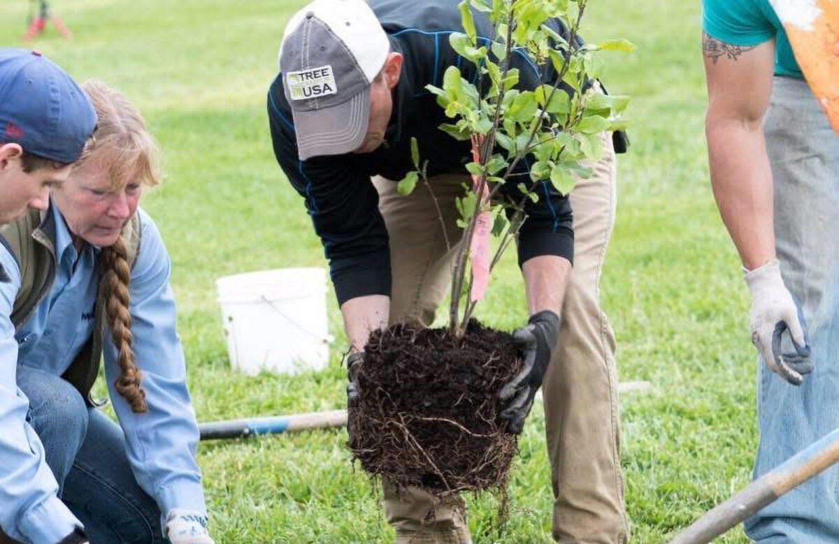 Eric Harshman supporting tree Planting.
